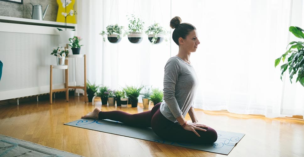 a woman doing yoga